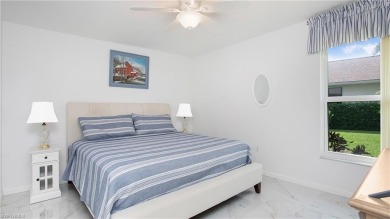 Experience long, unobstructed lake views and relaxed living just on The Glades Golf and Country Club in Florida - for sale on GolfHomes.com, golf home, golf lot