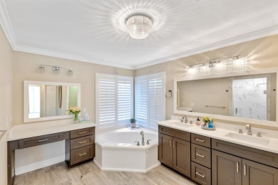 Tucked behind the private gates of the prestigious Emerald Bay on Emerald Bay Golf Club in Florida - for sale on GolfHomes.com, golf home, golf lot