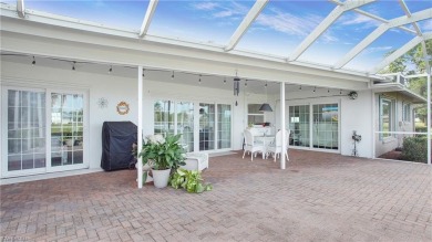 Experience long, unobstructed lake views and relaxed living just on The Glades Golf and Country Club in Florida - for sale on GolfHomes.com, golf home, golf lot