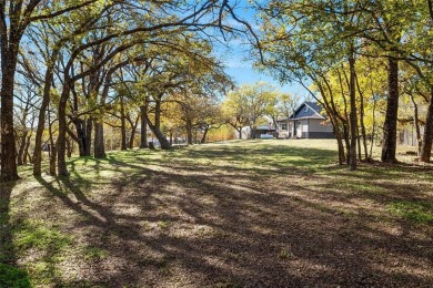 Discover this fully renovated farmhouse situated on a 1.37 acre on Denton Country Club in Texas - for sale on GolfHomes.com, golf home, golf lot