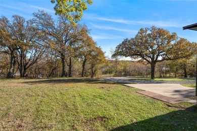 Discover this fully renovated farmhouse situated on a 1.37 acre on Denton Country Club in Texas - for sale on GolfHomes.com, golf home, golf lot