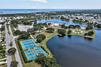 RARE OPPORTUNITY to own this gently used home on TWO LOTS on Barefoot Bay Golf Course in Florida - for sale on GolfHomes.com, golf home, golf lot