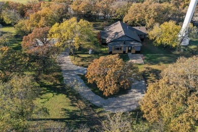 Discover this fully renovated farmhouse situated on a 1.37 acre on Denton Country Club in Texas - for sale on GolfHomes.com, golf home, golf lot