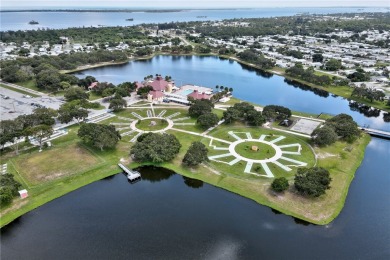 RARE OPPORTUNITY to own this gently used home on TWO LOTS on Barefoot Bay Golf Course in Florida - for sale on GolfHomes.com, golf home, golf lot