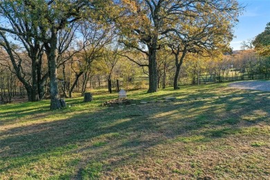 Discover this fully renovated farmhouse situated on a 1.37 acre on Denton Country Club in Texas - for sale on GolfHomes.com, golf home, golf lot