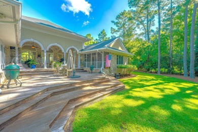 Nestled in the exclusive, gated golf course community of Dunes on Dunes West Golf Club in South Carolina - for sale on GolfHomes.com, golf home, golf lot