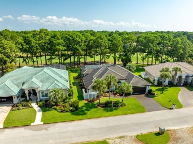 Tucked behind the private gates of the prestigious Emerald Bay on Emerald Bay Golf Club in Florida - for sale on GolfHomes.com, golf home, golf lot