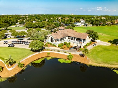 Tucked behind the private gates of the prestigious Emerald Bay on Emerald Bay Golf Club in Florida - for sale on GolfHomes.com, golf home, golf lot