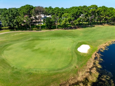 Tucked behind the private gates of the prestigious Emerald Bay on Emerald Bay Golf Club in Florida - for sale on GolfHomes.com, golf home, golf lot