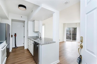 Elevated living awaits in this beautifully appointed one-bedroom on Bobby Jones Golf Club in Georgia - for sale on GolfHomes.com, golf home, golf lot