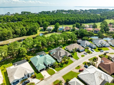Tucked behind the private gates of the prestigious Emerald Bay on Emerald Bay Golf Club in Florida - for sale on GolfHomes.com, golf home, golf lot