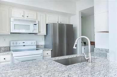 Elevated living awaits in this beautifully appointed one-bedroom on Bobby Jones Golf Club in Georgia - for sale on GolfHomes.com, golf home, golf lot