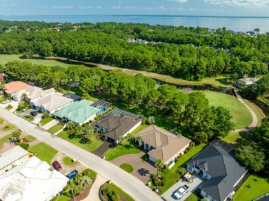 Tucked behind the private gates of the prestigious Emerald Bay on Emerald Bay Golf Club in Florida - for sale on GolfHomes.com, golf home, golf lot