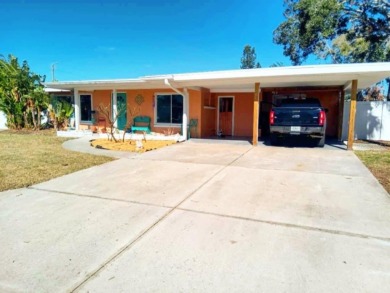 Gorgeous Dunedin pool home for sale. This house is located in on The Dunedin Country Club in Florida - for sale on GolfHomes.com, golf home, golf lot