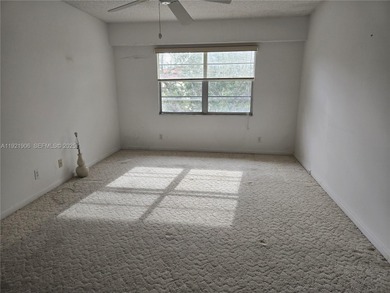 Gated 55+ community in Century Village. Has 24/7 security at on Flamingo Lakes Country Club in Florida - for sale on GolfHomes.com, golf home, golf lot