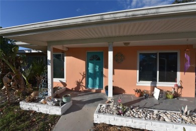 Gorgeous Dunedin pool home for sale. This house is located in on The Dunedin Country Club in Florida - for sale on GolfHomes.com, golf home, golf lot
