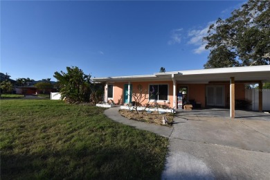 Gorgeous Dunedin pool home for sale. This house is located in on The Dunedin Country Club in Florida - for sale on GolfHomes.com, golf home, golf lot
