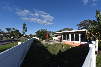 Gorgeous Dunedin pool home for sale. This house is located in on The Dunedin Country Club in Florida - for sale on GolfHomes.com, golf home, golf lot