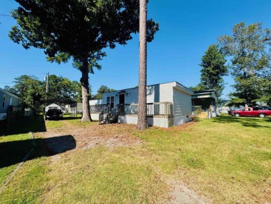 AFFORDABLE BEACH LIVING AT CRYSTAL LAKE! Whether you're looking on Prestwick Country Club in South Carolina - for sale on GolfHomes.com, golf home, golf lot