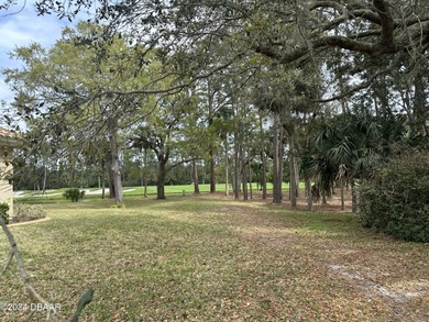 Ready to build, cleared, extra long lot in 24/7 guard gated on Plantation Bay Golf and Country Club in Florida - for sale on GolfHomes.com, golf home, golf lot