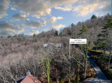 This 2.1-acre lot offers big views, and an installed septic, and on Highlands Country Club in North Carolina - for sale on GolfHomes.com, golf home, golf lot