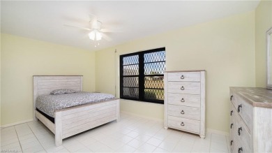 Enjoy the best of Naples living in this charming villa, ideally on The Glades Golf and Country Club in Florida - for sale on GolfHomes.com, golf home, golf lot