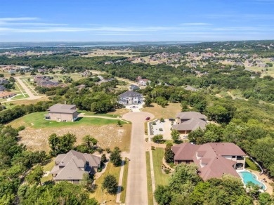 Nestled within the prestigious gated enclave of Lake Ridge in on Tangle Ridge Golf Club in Texas - for sale on GolfHomes.com, golf home, golf lot