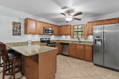 Charming and spacious 2-bedroom, 2-bathroom townhome located on Heritage Ridge Golf Club in Florida - for sale on GolfHomes.com, golf home, golf lot