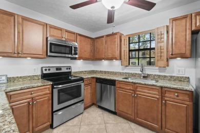 Charming and spacious 2-bedroom, 2-bathroom townhome located on Heritage Ridge Golf Club in Florida - for sale on GolfHomes.com, golf home, golf lot