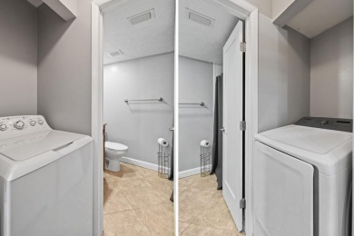 Charming and spacious 2-bedroom, 2-bathroom townhome located on Heritage Ridge Golf Club in Florida - for sale on GolfHomes.com, golf home, golf lot