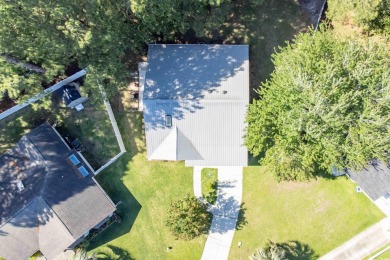 Welcome to 9664 Middleton Ct - a charming Lowcountry-style on Indigo Creek Golf Club in South Carolina - for sale on GolfHomes.com, golf home, golf lot