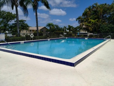 Charming and spacious 2-bedroom, 2-bathroom townhome located on Heritage Ridge Golf Club in Florida - for sale on GolfHomes.com, golf home, golf lot