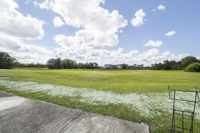 Charming and spacious 2-bedroom, 2-bathroom townhome located on Heritage Ridge Golf Club in Florida - for sale on GolfHomes.com, golf home, golf lot