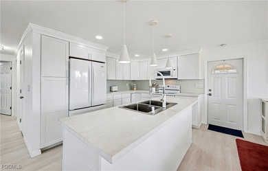 Beautifully remodeled, fully furnished manufactured home in a on Riverbend Golf and Country Club in Florida - for sale on GolfHomes.com, golf home, golf lot