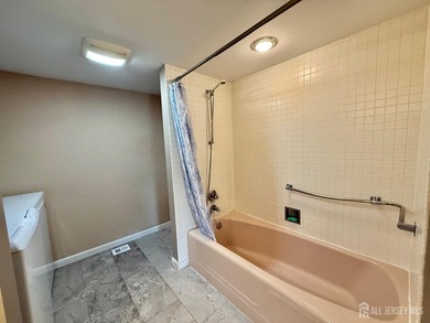 Welcome to this sought after Hancock second floor model offering on Rossmoor Golf Club in New Jersey - for sale on GolfHomes.com, golf home, golf lot