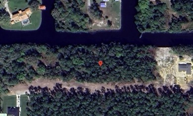 Come build your forever home on this one-half acre CANAL lot on Indian Lake Estates Golf and Country Club in Florida - for sale on GolfHomes.com, golf home, golf lot