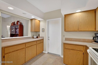 This beautifully maintained three-bedroom, two-bathroom on Spruce Creek Golf Club in Florida - for sale on GolfHomes.com, golf home, golf lot