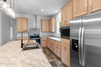 Modern, fresh, and move-in ready, this brand-new 3-bedroom on The Lakes Country Club in North Carolina - for sale on GolfHomes.com, golf home, golf lot