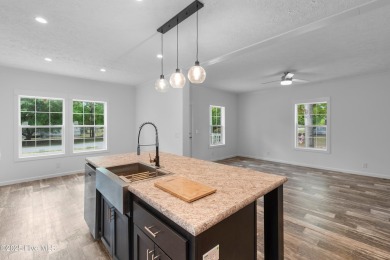 Modern, fresh, and move-in ready, this brand-new 3-bedroom on The Lakes Country Club in North Carolina - for sale on GolfHomes.com, golf home, golf lot