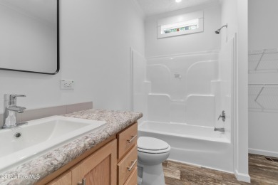 Modern, fresh, and move-in ready, this brand-new 3-bedroom on The Lakes Country Club in North Carolina - for sale on GolfHomes.com, golf home, golf lot