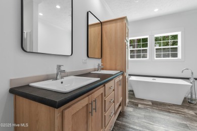 Modern, fresh, and move-in ready, this brand-new 3-bedroom on The Lakes Country Club in North Carolina - for sale on GolfHomes.com, golf home, golf lot