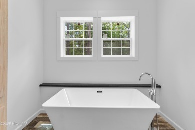 Modern, fresh, and move-in ready, this brand-new 3-bedroom on The Lakes Country Club in North Carolina - for sale on GolfHomes.com, golf home, golf lot