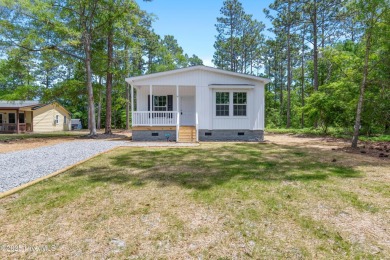 Modern, fresh, and move-in ready, this brand-new 3-bedroom on The Lakes Country Club in North Carolina - for sale on GolfHomes.com, golf home, golf lot