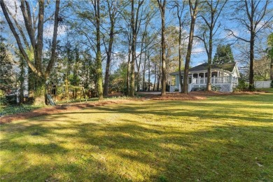 Charm abounds in this beautifully maintained traditional on Bobby Jones Golf Club in Georgia - for sale on GolfHomes.com, golf home, golf lot
