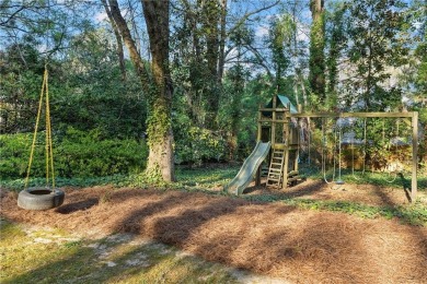 Charm abounds in this beautifully maintained traditional on Bobby Jones Golf Club in Georgia - for sale on GolfHomes.com, golf home, golf lot
