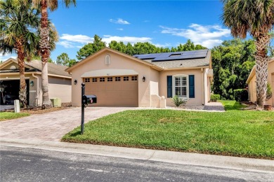 Welcome to this beautifully maintained 2-bedroom, 2-bath home on Stonegate Golf Club in Florida - for sale on GolfHomes.com, golf home, golf lot