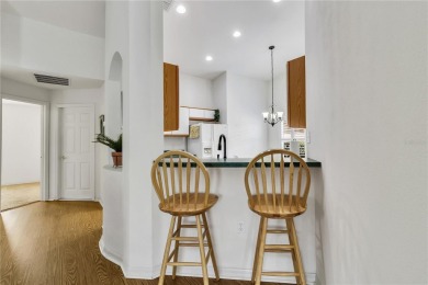 Welcome to this beautifully maintained 2-bedroom, 2-bath home on Stonegate Golf Club in Florida - for sale on GolfHomes.com, golf home, golf lot