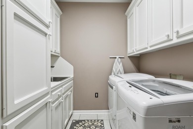 Your private retreat awaits! This exquisite 3-bedroom, 2.5-bath on The Oaks At Sherwood Golf Course in Louisiana - for sale on GolfHomes.com, golf home, golf lot