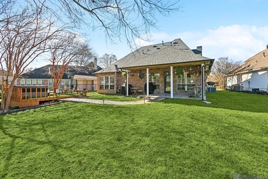 Your private retreat awaits! This exquisite 3-bedroom, 2.5-bath on The Oaks At Sherwood Golf Course in Louisiana - for sale on GolfHomes.com, golf home, golf lot