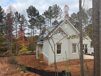 This  beautiful custom home built by gold winning Triple A Homes on Chapel Ridge Golf Club in North Carolina - for sale on GolfHomes.com, golf home, golf lot